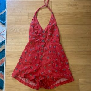Open Back Red Romper with floral pattern
